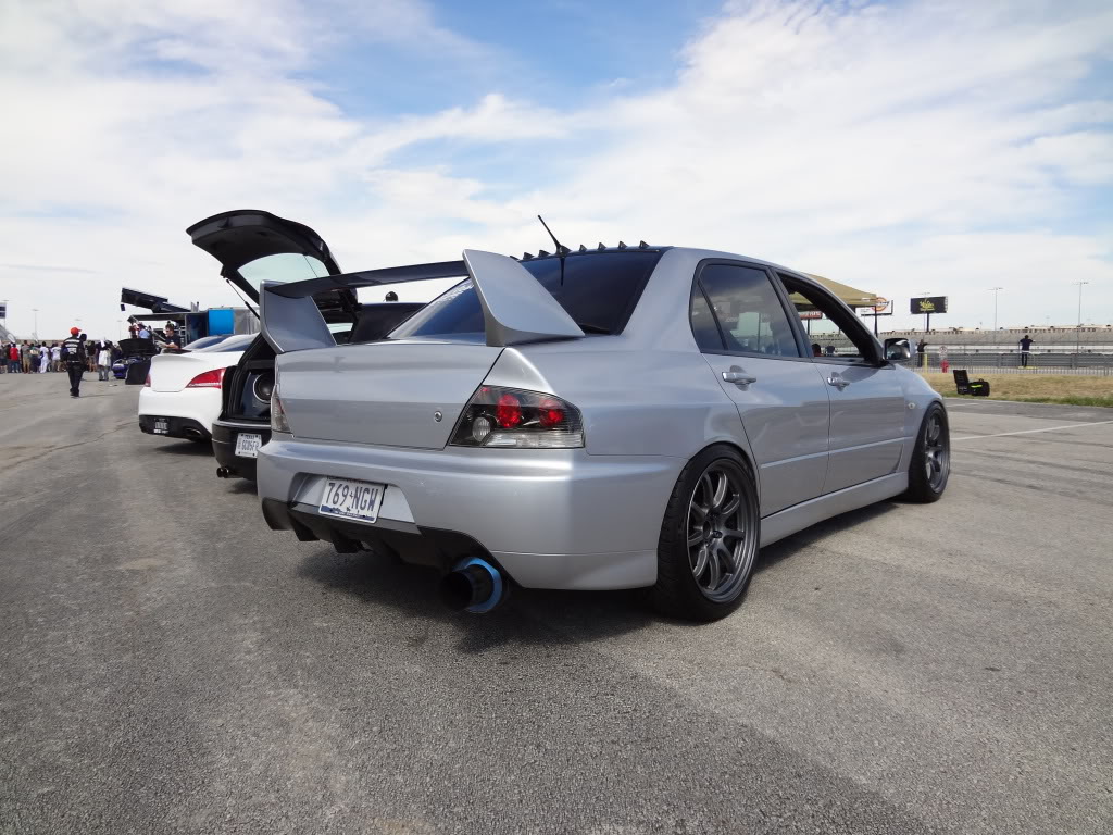 photo 3 Mitsubishi Lancer Evolution custom wheels Gramlight 57 18x9.5, ET +12, tire size 235/40 R18. x ET