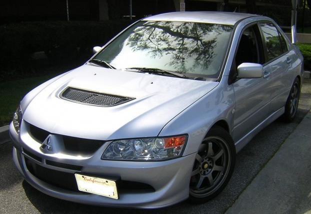photo 2 Mitsubishi Lancer Evolution custom wheels Gram Lights 57S 18x8.5, ET +30, tire size 245/40 R18. x ET