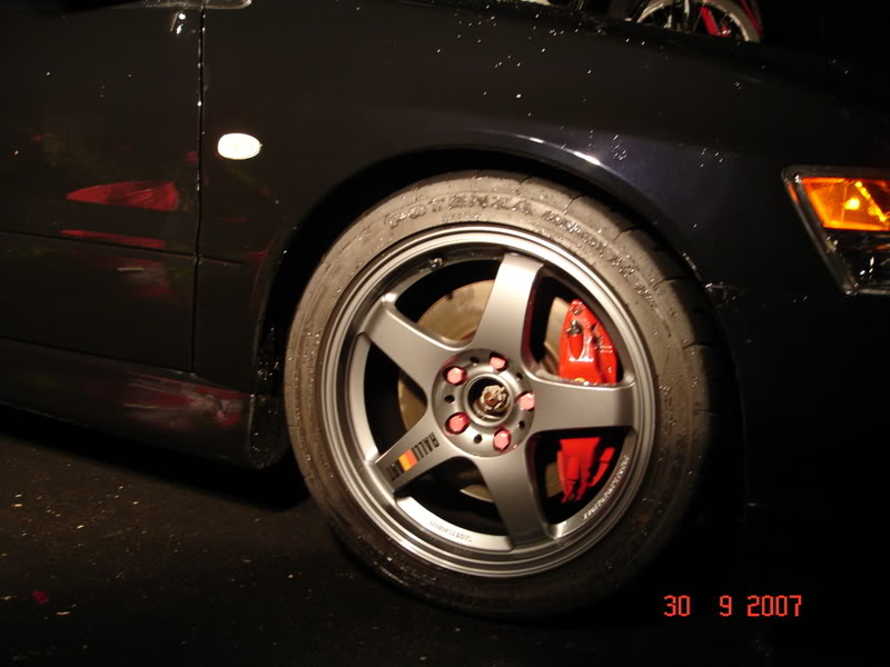 photo 3 Mitsubishi Lancer Evolution custom wheels OEM Mitsubishi Lancer Ralliart Evolution 17x8.0, ET +30, tire size 245/40 R17. x ET