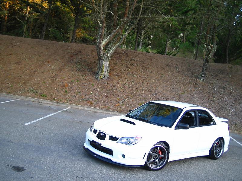 photo 1 Subaru Impreza WRX custom wheels Rays Engineering G-games 77 Wolf 18x9.5, ET +40, tire size 235/40 R18. x ET