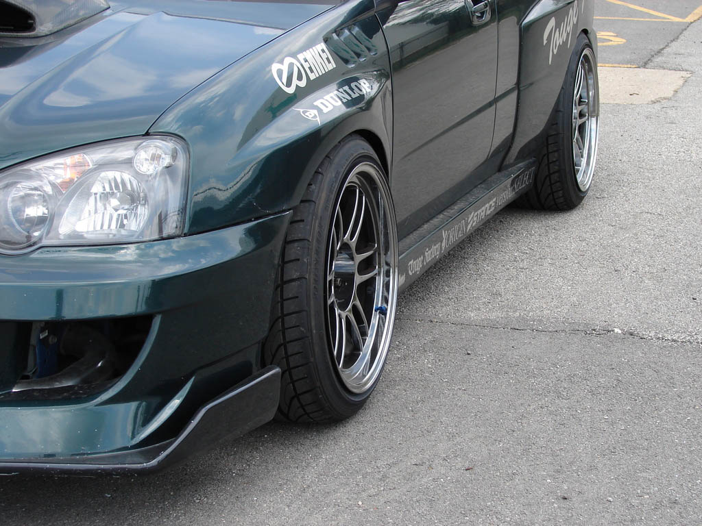 photo 2 Subaru Impreza WRX STi custom wheels Enkei RPF-1 18x10.5, ET +15, tire size 265/35 R18. x ET 