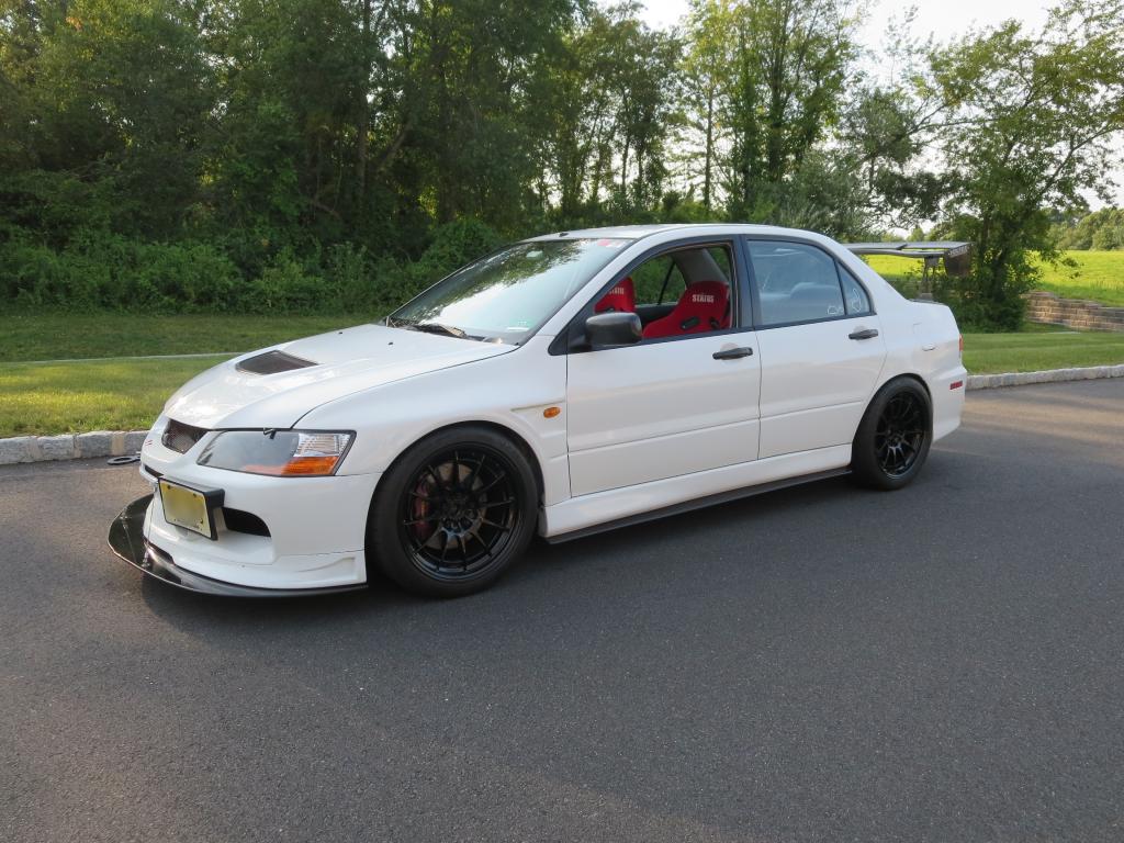 photo 1 Mitsubishi Lancer Evolution custom wheels Enkei NT03 18x9.5, ET +27, tire size 265/35 R18. x ET