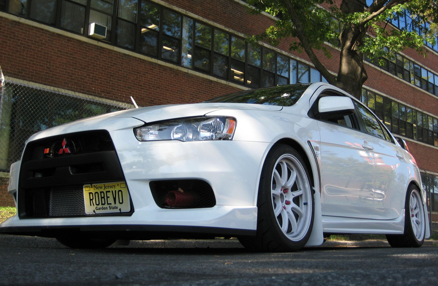 photo 1 Mitsubishi Lancer Evolution custom wheels Rays Engineering Gram Lights 57 Optimise 18x9.5, ET +22, tire size 255/35 R18. x ET