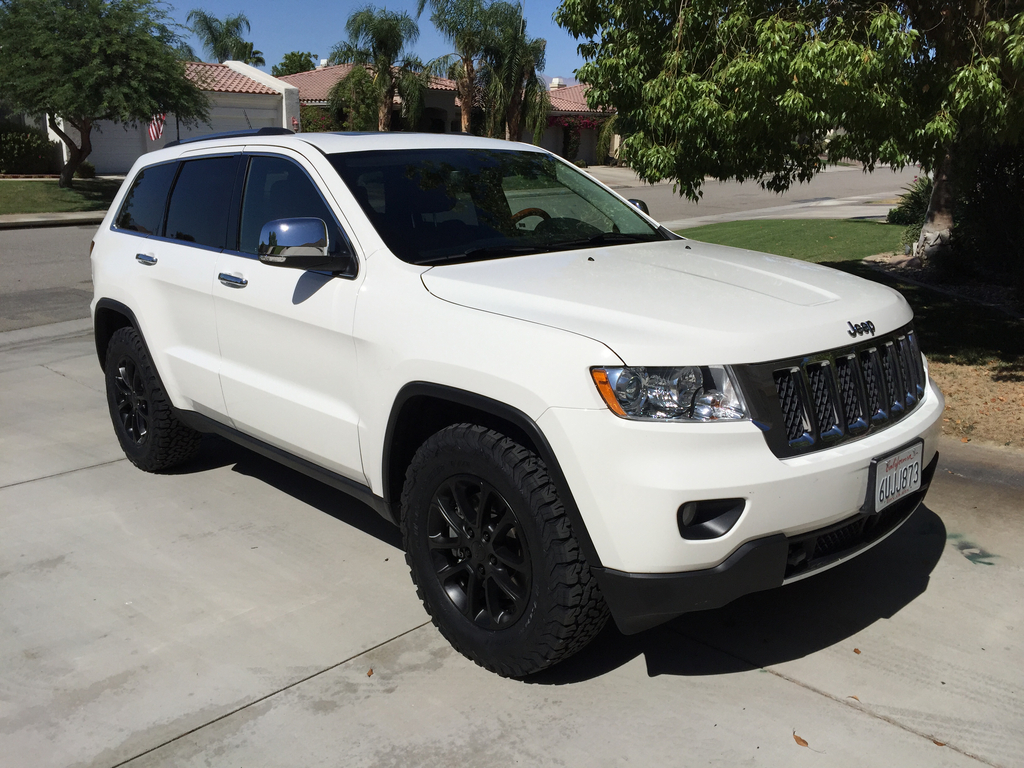 photo 1 Jeep Grand Cherokee custom wheels OEM 18x, ET , tire size 275/65 R18. x ET
