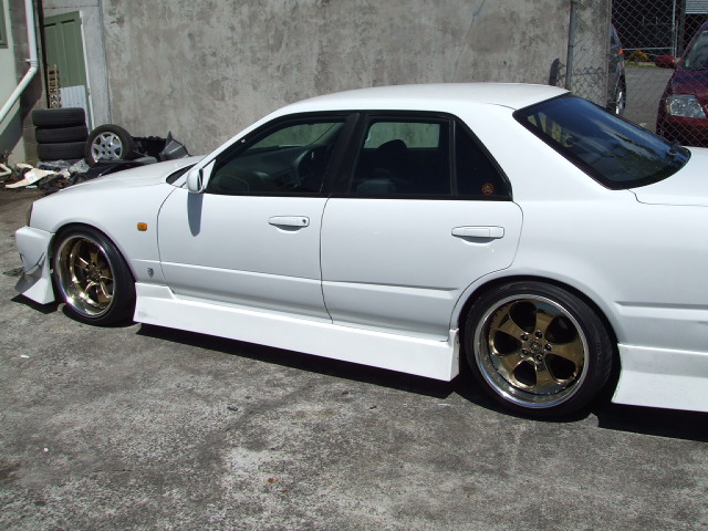 photo 2 Nissan R31-R34 Skyline 4dr custom wheels unsure  18x10.5, ET +14, tire size 235/40 R18. 18x11.5 ET+14 255/35 R18