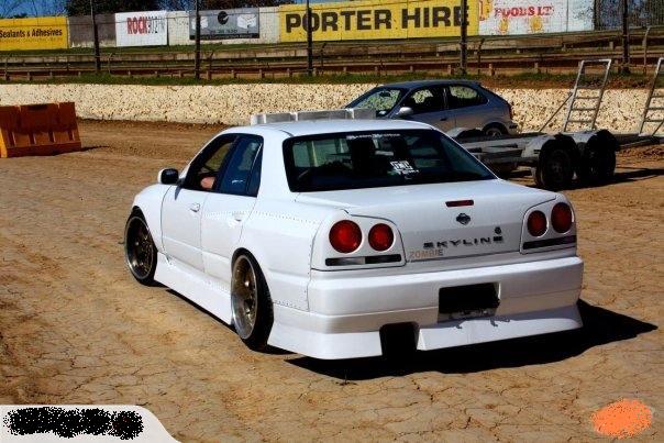 photo 4 Nissan R31-R34 Skyline 4dr custom wheels unsure  18x10.5, ET +14, tire size 235/40 R18. 18x11.5 ET+14 255/35 R18